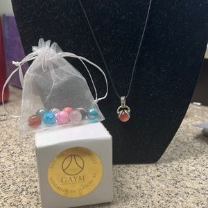 Authentic Got All Your Marbles SS & Bronze Pendant on Leather Cord
